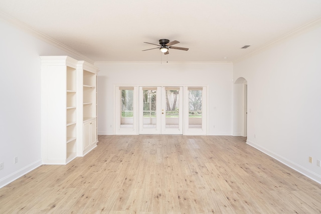 unfurnished living room with ceiling fan, french doors, light hardwood / wood-style floors, and ornamental molding