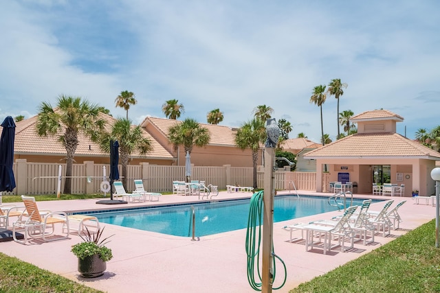 view of swimming pool with a patio