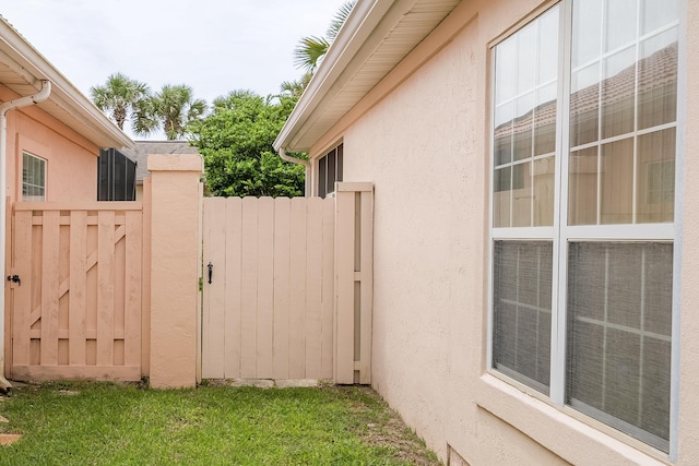 view of property exterior with a yard