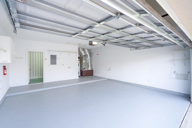 garage with electric panel and a garage door opener