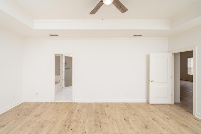 unfurnished room with ceiling fan, light hardwood / wood-style floors, and ornamental molding