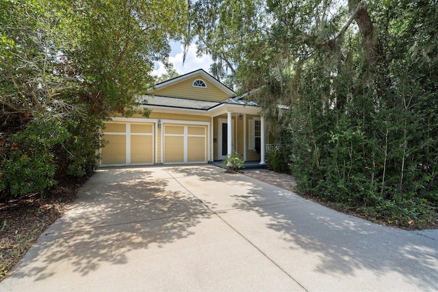 view of front of home with a garage