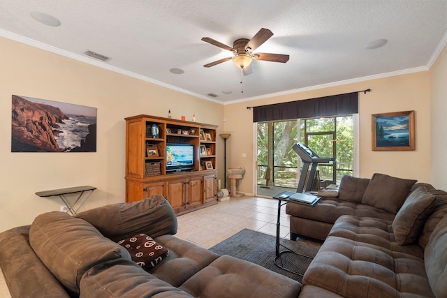 living room with crown molding, light tile patterned floors, and ceiling fan