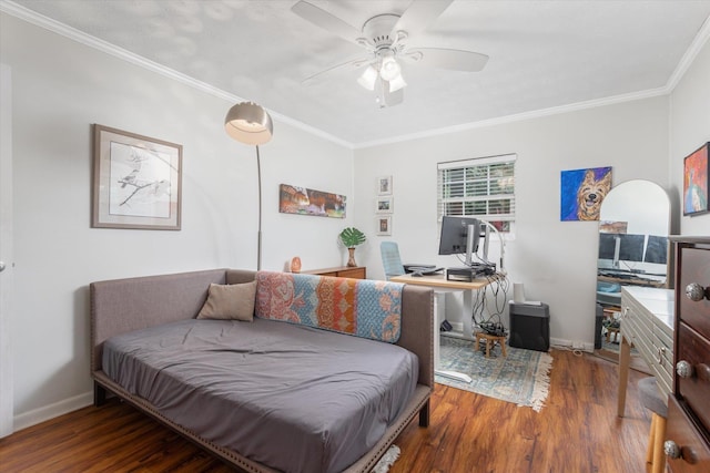 605 A St, Saint Augustine, FL 32080 - bedroom featuring an office area, wood finished floors, crown molding, and ceiling fan