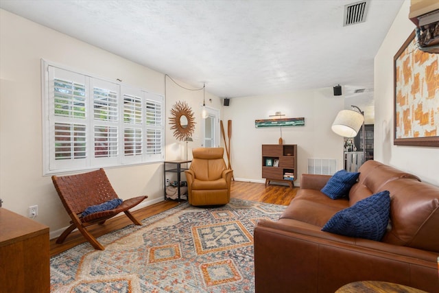 605 A St, Saint Augustine, FL 32080 - living area with wood finished floors and baseboards
