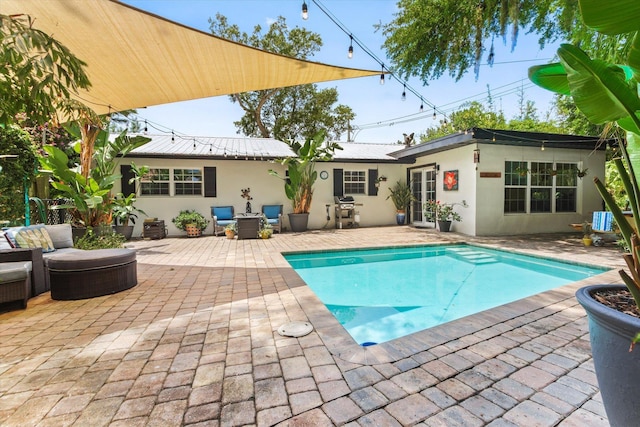 605 A St, Saint Augustine, FL 32080 - swimming pool featuring a patio area, an outdoor hangout area, and a grill