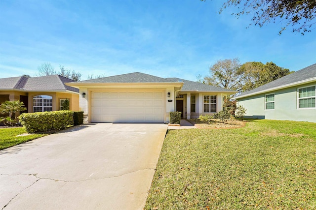 ranch-style house with an attached garage, stucco siding, concrete driveway, and a front yard