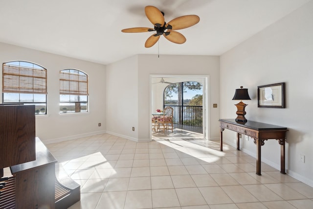 interior space featuring ceiling fan