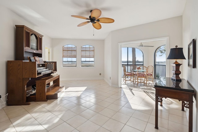 interior space featuring ceiling fan