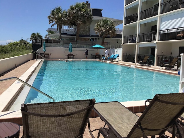 6970 A1A S Unit 106, Saint Augustine, FL 32080 - community pool featuring a patio area