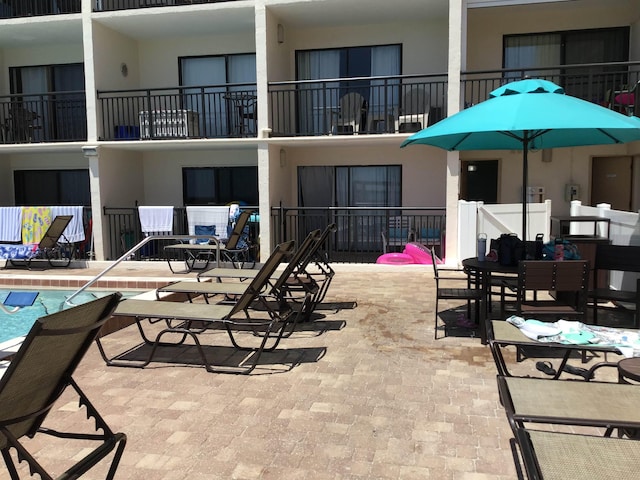 6970 A1A S Unit 106, Saint Augustine, FL 32080 - view of home's community with a patio area