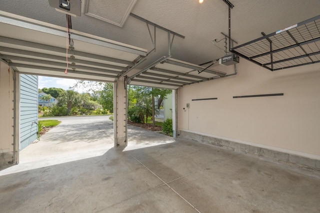 517 Weeping Willow Ln, Saint Augustine, FL 32080 - garage featuring a garage door opener