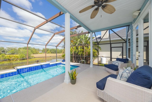 517 Weeping Willow Ln, Saint Augustine, FL 32080 - swimming pool featuring a patio, a ceiling fan, glass enclosure, and a water view