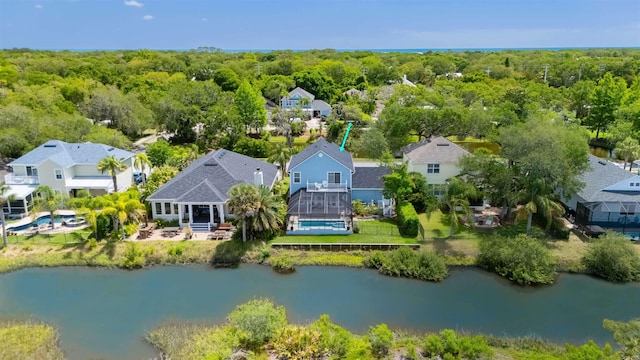 517 Weeping Willow Ln, Saint Augustine, FL 32080 - aerial view of residential area with a large body of water and a heavily wooded area