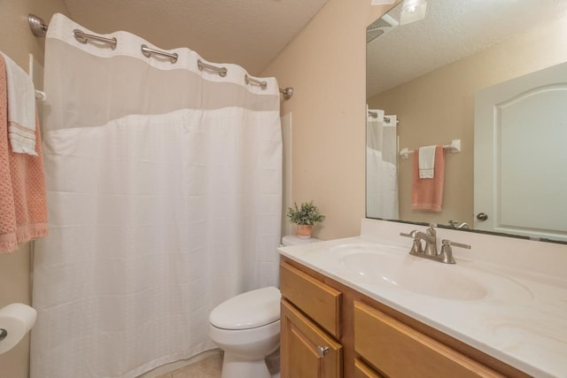 517 Weeping Willow Ln, Saint Augustine, FL 32080 - bathroom with toilet, vanity, a textured ceiling, and curtained shower