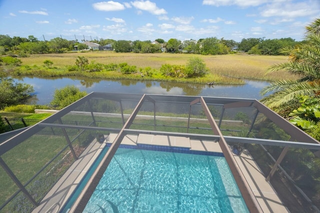 517 Weeping Willow Ln, Saint Augustine, FL 32080 - outdoor pool featuring glass enclosure and a water view