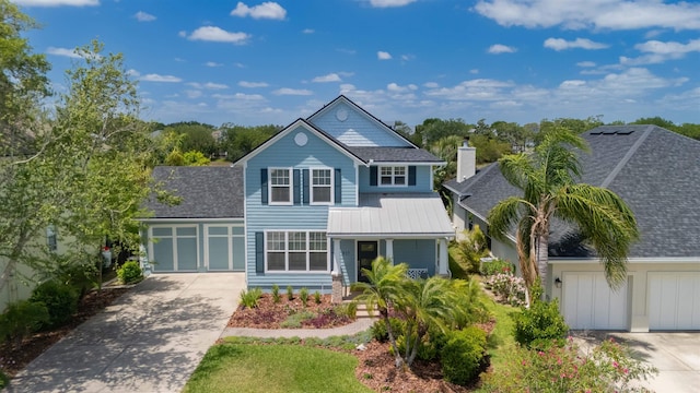 517 Weeping Willow Ln, Saint Augustine, FL 32080 - traditional-style home with concrete driveway, an attached garage, and roof with shingles