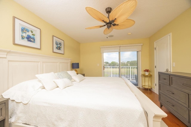 517 Weeping Willow Ln, Saint Augustine, FL 32080 - bedroom with access to outside, wood finished floors, a water view, and a ceiling fan