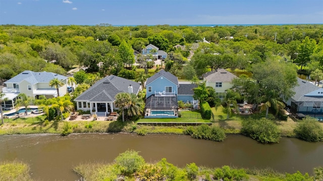 517 Weeping Willow Ln, Saint Augustine, FL 32080 - aerial perspective of suburban area featuring a large body of water and a heavily wooded area