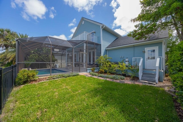 517 Weeping Willow Ln, Saint Augustine, FL 32080 - rear view of property featuring a lanai, roof with shingles, and a balcony