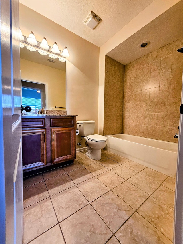 full bath featuring visible vents, toilet, tile patterned flooring, a textured ceiling, and vanity