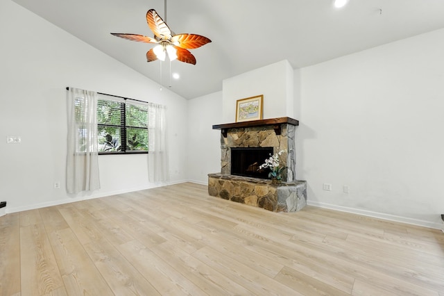 1684 Leon St, Saint Augustine, FL 32080 - unfurnished living room with a fireplace, a ceiling fan, wood finished floors, baseboards, and high vaulted ceiling