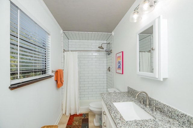 full bath featuring vanity, toilet, and wood finished floors