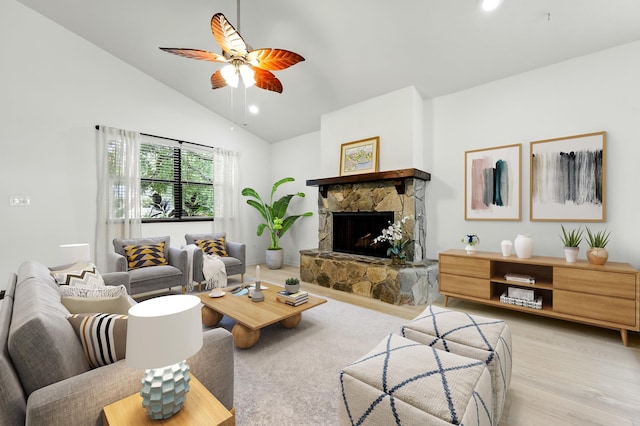 1684 Leon St, Saint Augustine, FL 32080 - living area featuring ceiling fan, lofted ceiling, a stone fireplace, wood finished floors, and recessed lighting