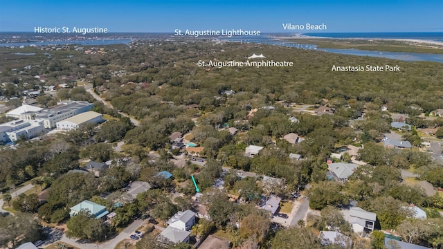 bird's eye view featuring a residential view and a water view