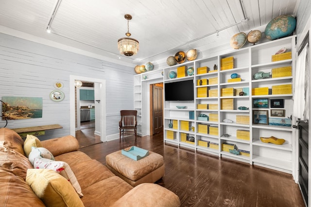 73 Kings Ferry Way, Saint Augustine, FL 32084 - living area featuring wood finished floors, track lighting, and wood walls