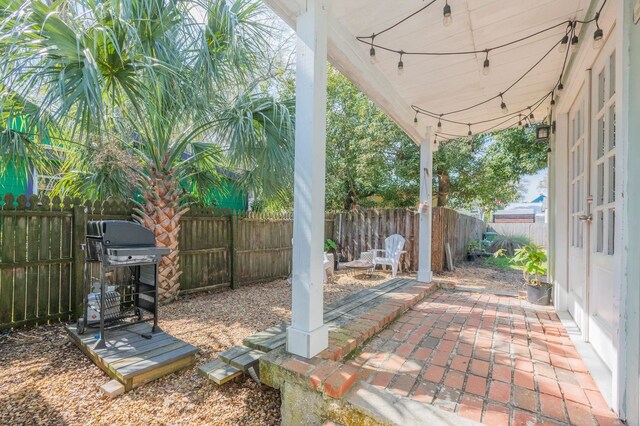 73 Kings Ferry Way, Saint Augustine, FL 32084 - view of patio / terrace with a grill and a fenced backyard