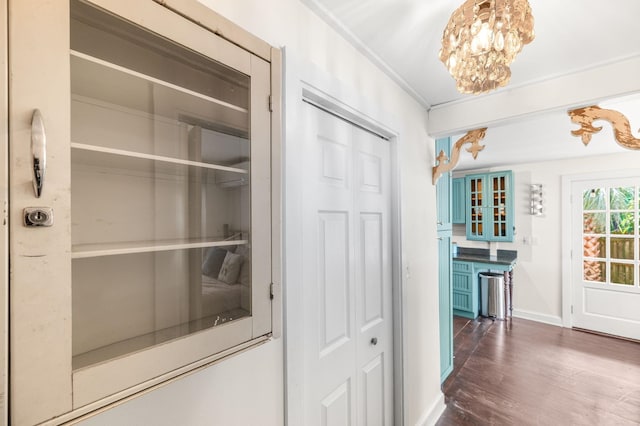 73 Kings Ferry Way, Saint Augustine, FL 32084 - interior space with dark wood finished floors, a notable chandelier, and baseboards
