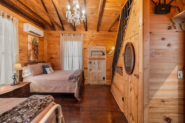 73 Kings Ferry Way, Saint Augustine, FL 32084 - bedroom with wooden walls, beam ceiling, dark wood-style flooring, wood ceiling, and a wall mounted air conditioner
