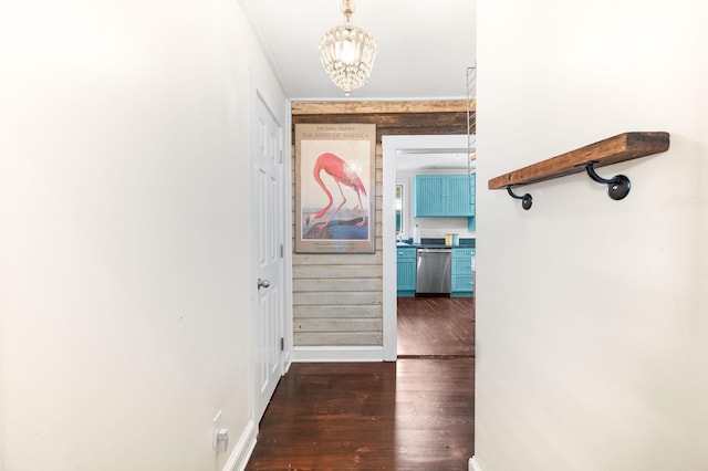 73 Kings Ferry Way, Saint Augustine, FL 32084 - corridor with baseboards, a chandelier, and dark wood-style flooring