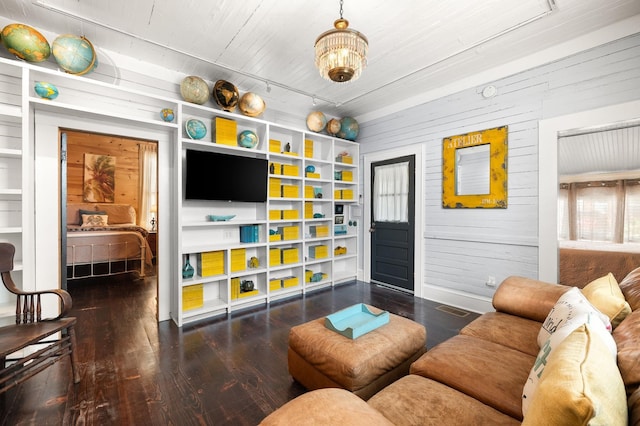 73 Kings Ferry Way, Saint Augustine, FL 32084 - living area with visible vents, wood walls, rail lighting, and wood finished floors