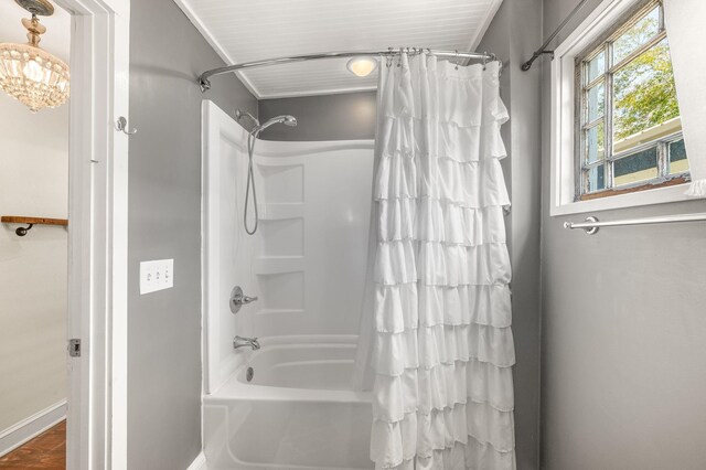73 Kings Ferry Way, Saint Augustine, FL 32084 - bathroom featuring baseboards and shower / bath combo with shower curtain