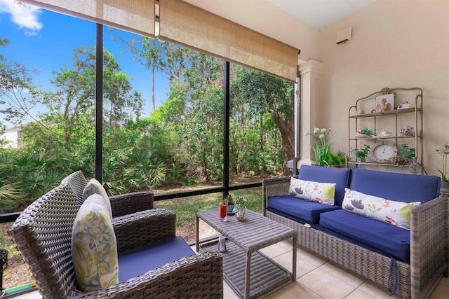 sunroom / solarium featuring outdoor lounge area and plenty of natural light