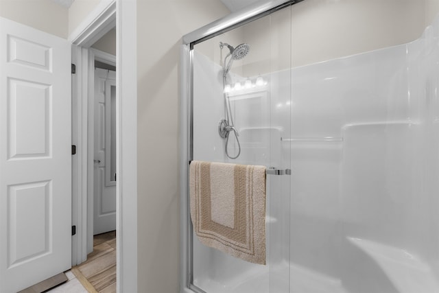 full bathroom with a stall shower