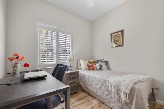 bedroom with light wood-style flooring