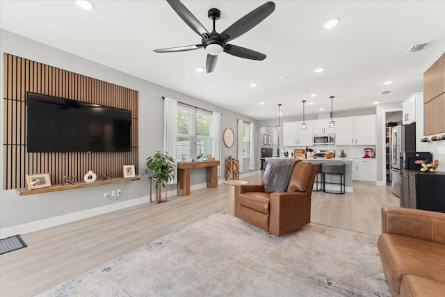 839 Lightsey Crossing Ln, Saint Augustine, FL 32084 - living area featuring light wood-type flooring, ceiling fan, and recessed lighting