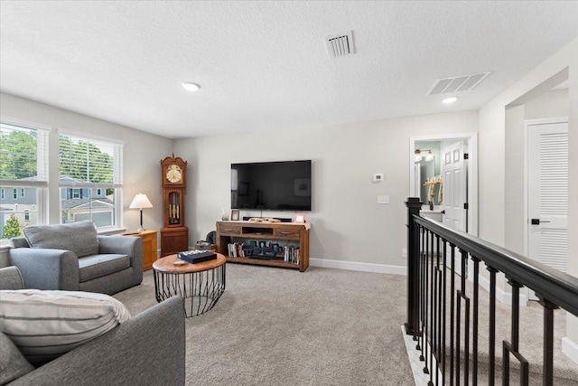 839 Lightsey Crossing Ln, Saint Augustine, FL 32084 - carpeted living room with a textured ceiling and baseboards