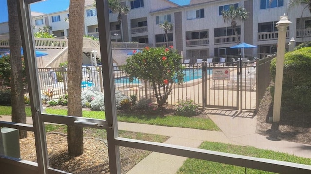 8130 A1A S Unit D-2, Saint Augustine, FL 32080 - pool featuring a residential view and fence
