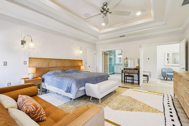 104 Fiddler Crab Ln, Saint Augustine, FL 32080 - bedroom featuring crown molding, a raised ceiling, light wood-type flooring, recessed lighting, and connected bathroom