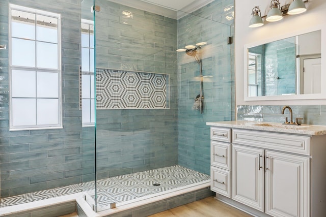 104 Fiddler Crab Ln, Saint Augustine, FL 32080 - full bathroom featuring a stall shower, vanity, healthy amount of natural light, and wood finished floors