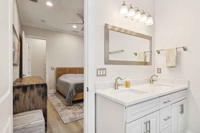 104 Fiddler Crab Ln, Saint Augustine, FL 32080 - full bath with double vanity, wood finished floors, a ceiling fan, recessed lighting, and connected bathroom