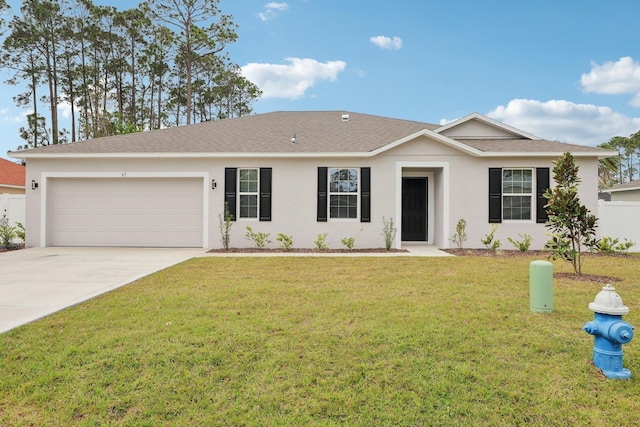 single story home with a garage, a front yard, driveway, and stucco siding