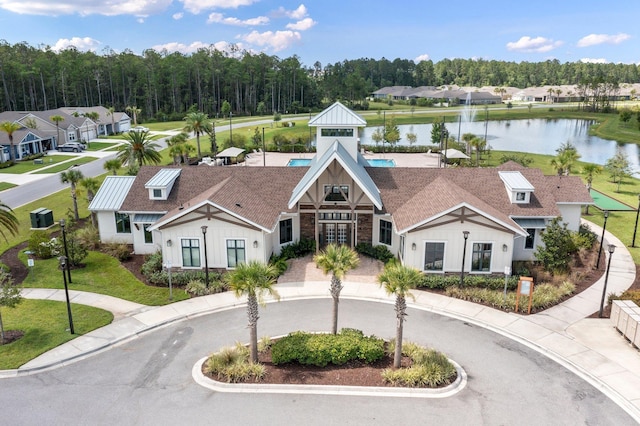 drone / aerial view featuring a water view