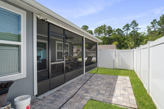 view of patio / terrace with a sunroom