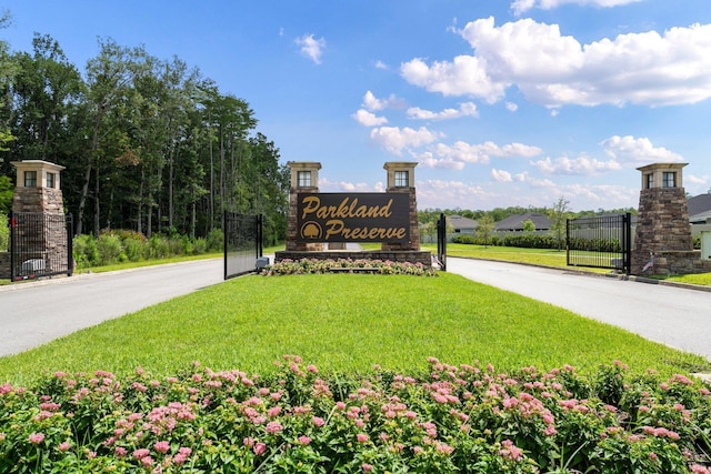 community sign with a yard