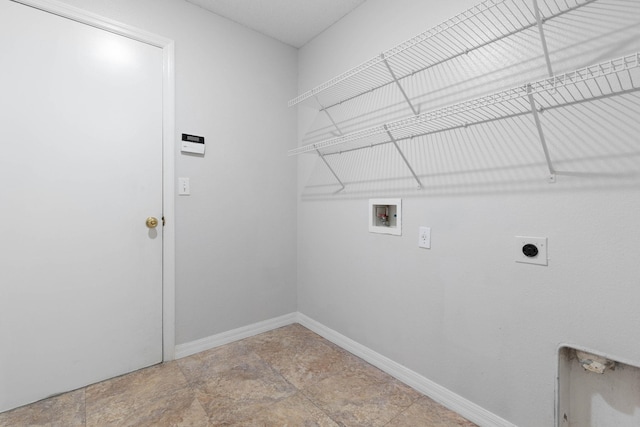 laundry room with washer hookup, laundry area, baseboards, and electric dryer hookup